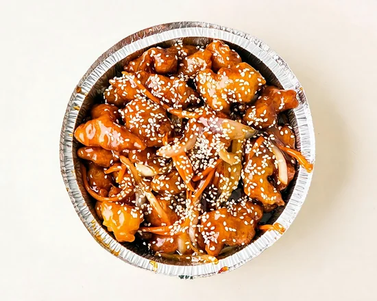 Szechuan sesame chicken topped with sesame seeds